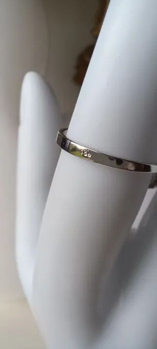 Anillo Plata Rodiada con 2 circonitas.