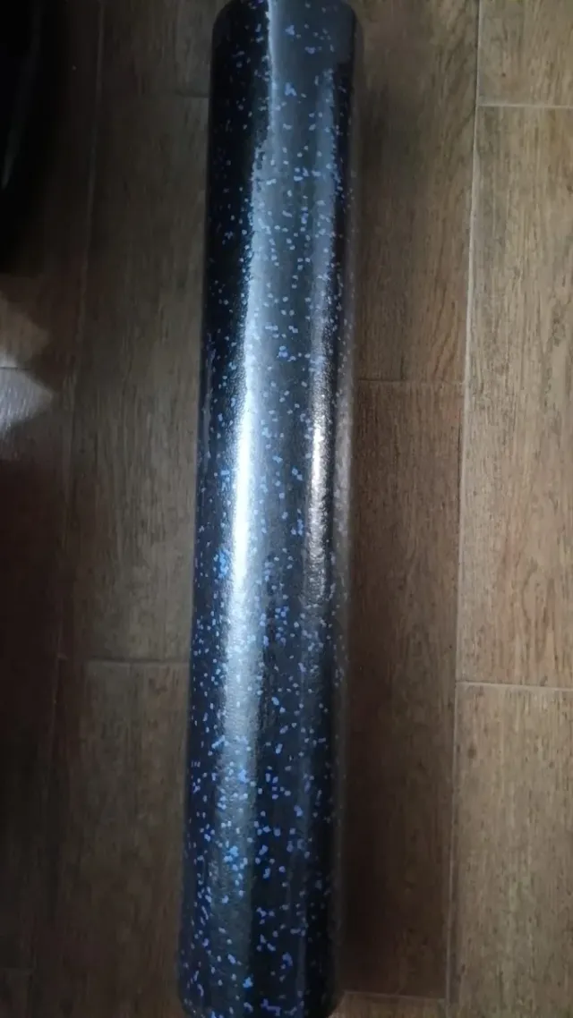 Rulo de ejercicio negro con puntos