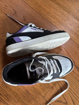 Scarpe Puma bianche e nere con viola