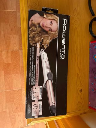 Rizador de pelo Rowenta color oro y blanco