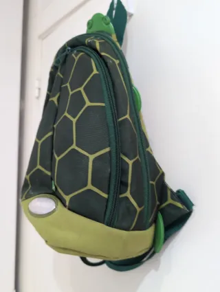 Mochila verde y multicolor Samsonite.Pequeña niños