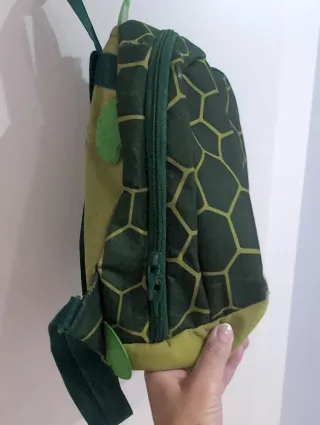 Mochila verde y multicolor Samsonite.Pequeña niños