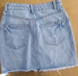 Mini falda vaquera desgastada azul T.XS