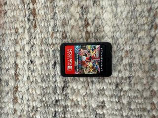 Nintendo Switch + Mario Kart 8 Deluxe + Accesorios