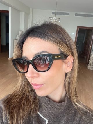 Gafas de sol Prada negras y marrones