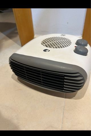 Calefactor blanco y gris