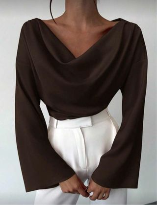 Blusa cuello barco manga acampanada