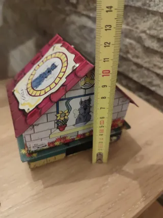 Hucha vintage de hojalata Fido con su caja