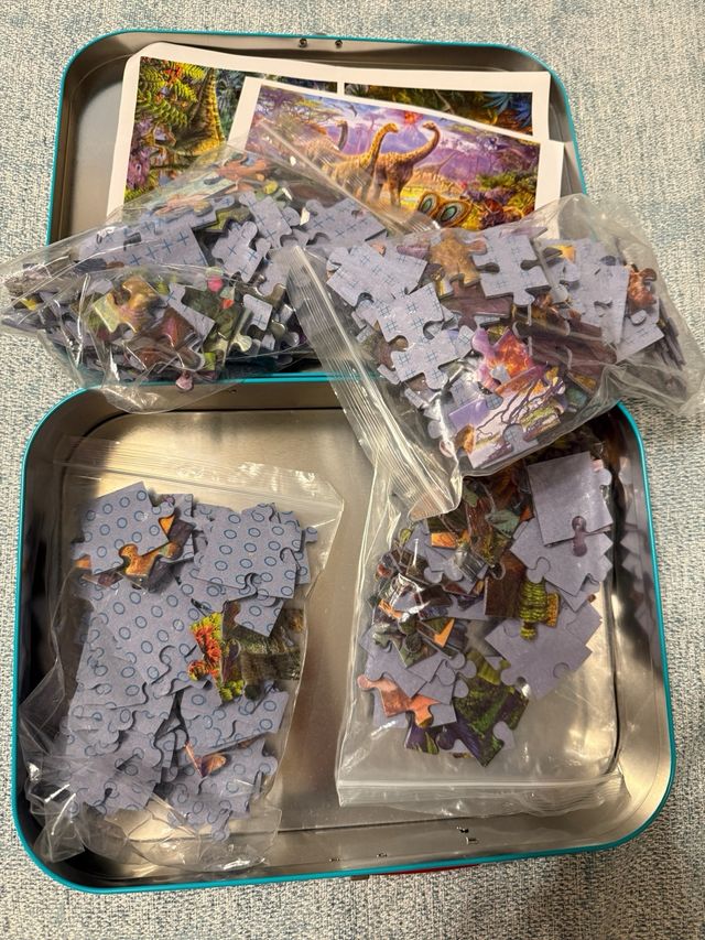 Maletín metal con 4 Puzzles Dinosaurios