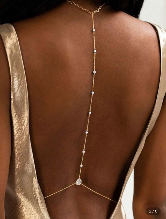 Joyería para espalda dorada