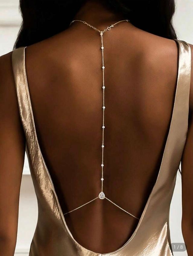 Joyería para espalda dorada