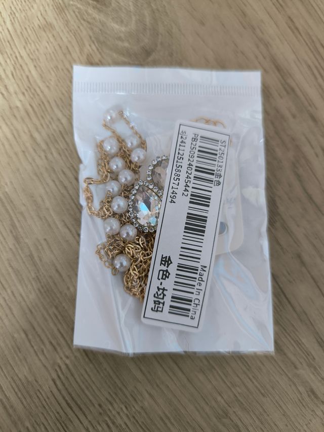 Joyería para espalda dorada