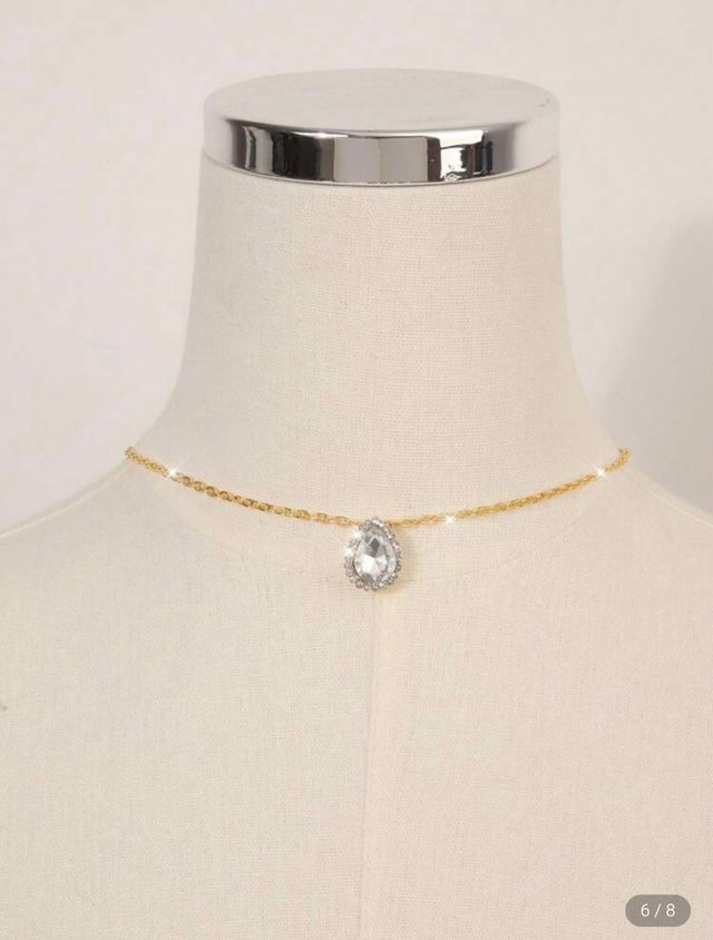 Joyería para espalda dorada