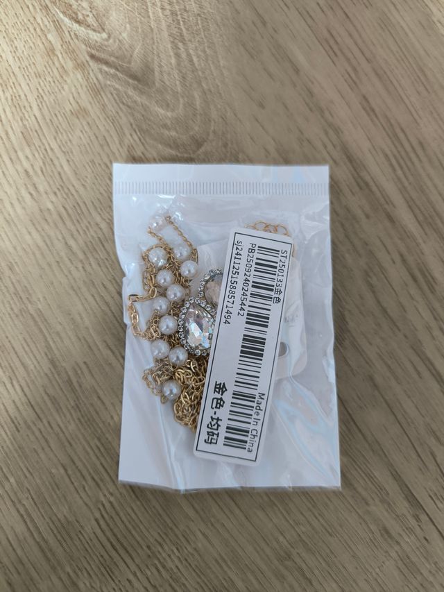 Joyería para espalda dorada