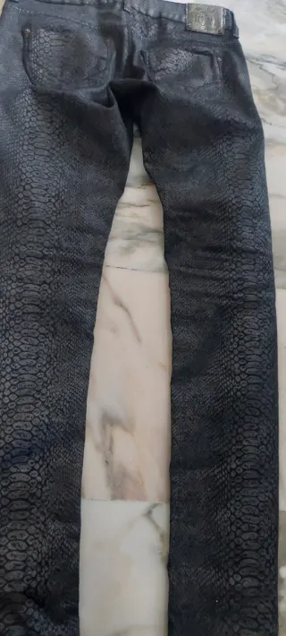 Pantalones efecto piel animal print