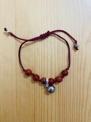 Bracciale pietre rosse con campanella