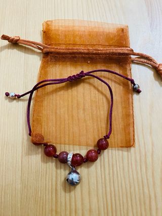 Bracciale pietre rosse con campanella