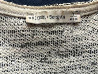 Chaqueta de punto gris con flecos