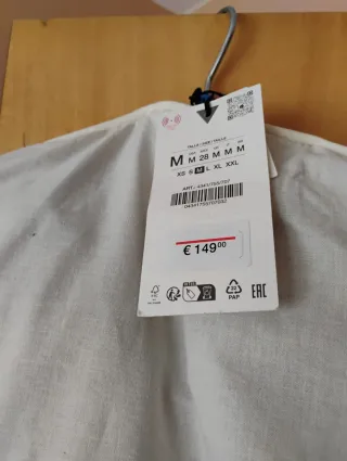 Cazadora trenca de zara de ante con cuello marron.