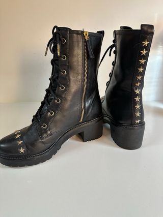 Botas Michael Kors Piel Negra con Estrellas Dorada