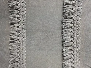 Vestido negro con flecos