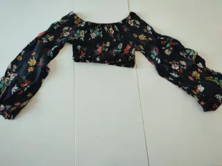 Crop top floral manga larga