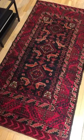 Tappeto pakistano in lana nera e rossa