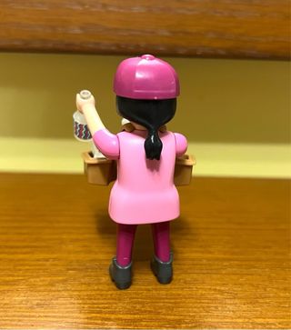 Playmobil Chica con Carrito de snacks.
