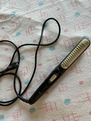 Plancha de pelo negra