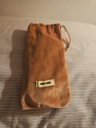 Gafas de sol Miu Miu blancas y moradas