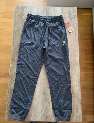 Pantalones Asics grises