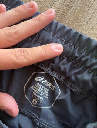 Pantalones Asics grises
