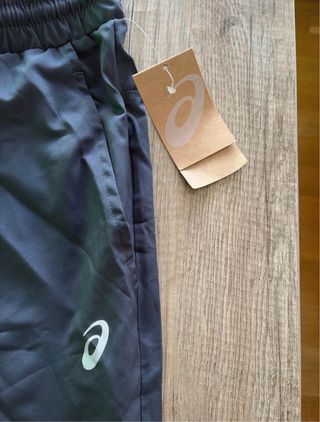 Pantalones Asics grises