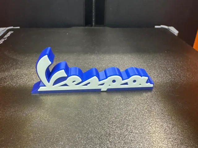 Soporte Logo Vespa Azul y Blanco