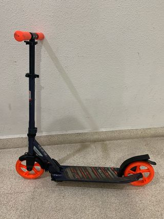 Patinete Oxelo naranja y azul ozcuro