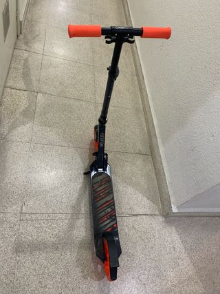 Patinete Oxelo naranja y azul ozcuro