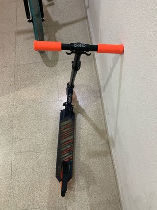 Patinete Oxelo naranja y azul ozcuro