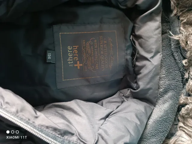 Abrigo niña con capucha y pelo