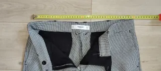 Pantalón cuadros mujer gris y blanco