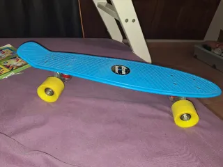 Monopatín azul Olsson Brothers