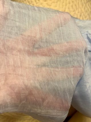 Camisa sin mangas y con volantes.Azul celeste