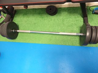 Barra de pesas con discos