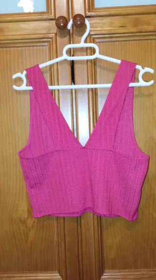 Top asimétrico fucsia