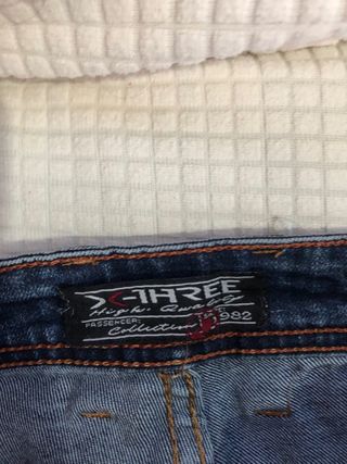 Jeans strappati blu uomo