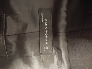 Chaqueta negra con flecos