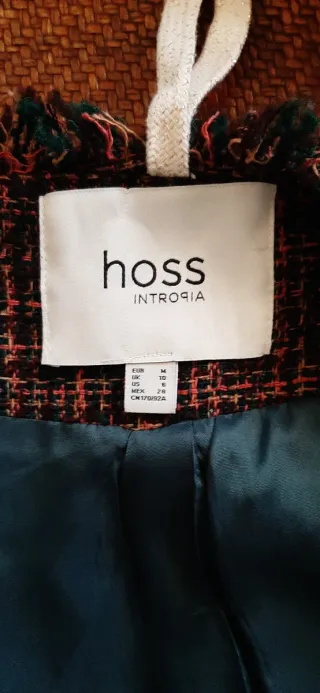 Chaqueta estilo Chanel en tonos marrones Y verdes.