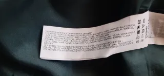 Chaqueta estilo Chanel en tonos marrones Y verdes.