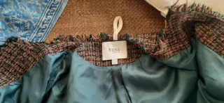 Chaqueta estilo Chanel en tonos marrones Y verdes.