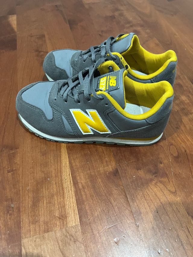 Zapatillas New Balance 373 Gris y Amarillo