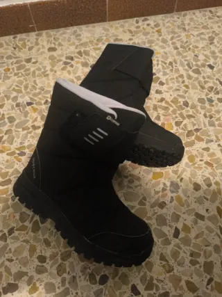 Pantalón 10-12 y botas de nieve36